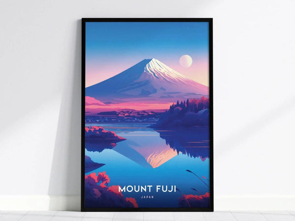 A framed poster of Mount Fuji with a snow-capped peak is set against a vibrant sunset, reflected in calm waters, with Mount Fuji, Japan text at the bottom.