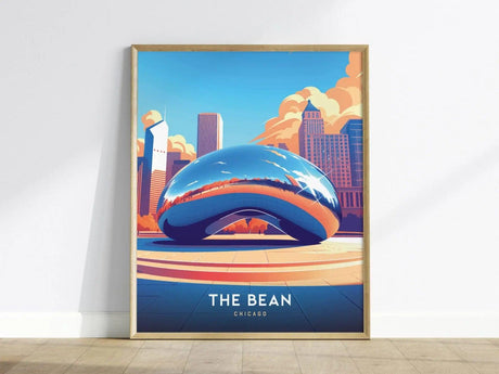 Framed artwork of the Chicago skyline features the reflective Cloud Gate sculpture, set against a vibrant blue sky with clouds. The poster reads The Bean Chicago at the bottom.