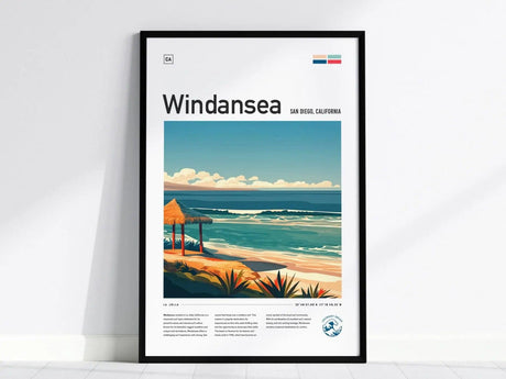 Framed poster of Windansea Beach showcases an illustrated coastline with waves, a straw hut, and lush plants under a blue sky. The text highlights La Jolla, San Diego, California.