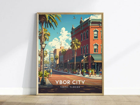 A colorful poster depicting Ybor City, Tampa, Florida, showcases a vibrant street scene with detailed architecture, palm trees, and pedestrians under a bright blue sky.