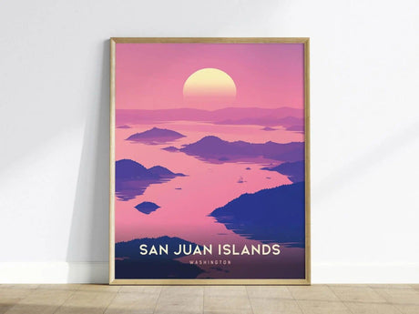 Framed San Juan Islands poster featuring a sunset over tranquil waters and silhouetted islands in shades of pink and purple, with San Juan Islands Washington text at the bottom.