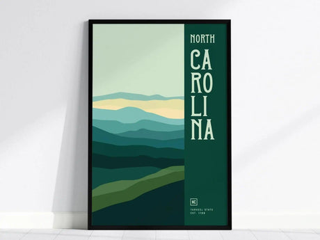 Framed minimalist poster featuring stylized rolling green hills and the text North Carolina in bold letters. The design captures a serene landscape with layered mountain silhouettes.