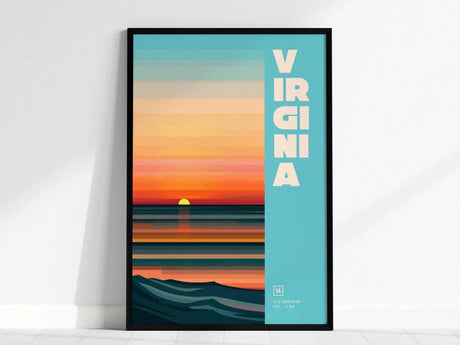 Framed poster featuring a vibrant sunset over ocean waves with VIRGINIA in bold letters on a teal background. The design includes warm orange and blue hues, evoking a serene coastal.