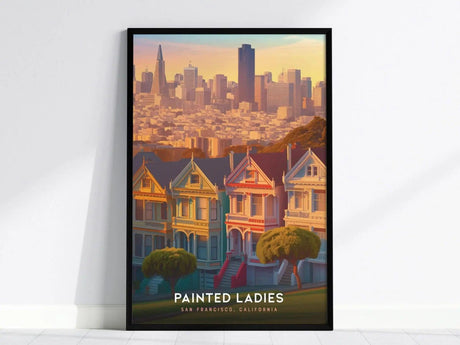 Framed poster of San Franciscos iconic Painted Ladies with a city skyline backdrop, showcasing colorful Victorian homes and high-rise buildings under a warm sunset glow.