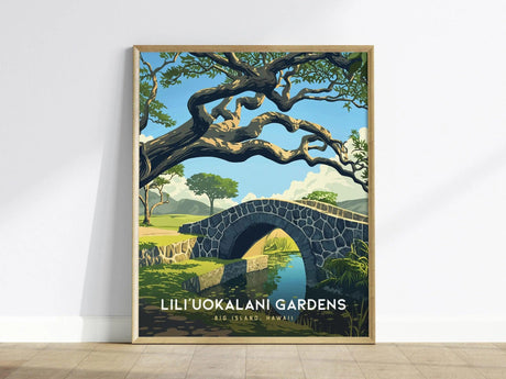 Framed poster depicting a stone arched bridge over a serene pond, with lush trees and a bright blue sky in the background. Text reads Liliuokalani Gardens, Big Island, Hawaii.