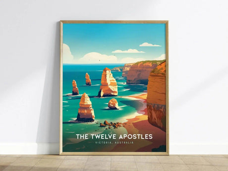 A framed poster depicting the Twelve Apostles with vibrant limestone stacks against a turquoise ocean, under a clear blue sky, labeled The Twelve Apostles, Victoria, Australia.