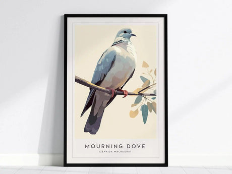 A framed poster features an artistic illustration of a Mourning Dove perched on a branch with leaves, set against a soft background. The text reads Mourning Dove (Zenaida macroura).