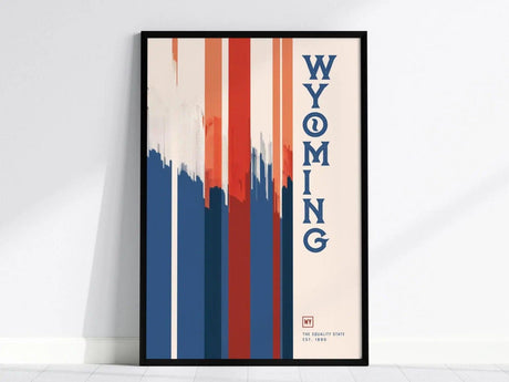 Framed poster featuring bold vertical stripes in red, white, and blue with the word WYOMING in blue text. Includes The Equality State Est. 1890 at the bottom.