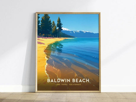 Framed poster of Baldwin Beach, Lake Tahoe, featuring golden sand, clear blue water, and a forested shoreline with snow-capped mountains in the background.