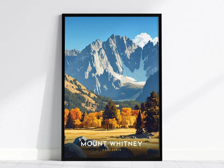 Framed poster of Mount Whitney, featuring dramatic granite peaks under a bright blue sky, with autumn-colored trees in the foreground. The text below reads Mount Whitney, California.