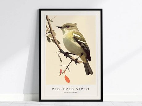 A framed poster showcases a Red-Eyed Vireo perched on a branch, highlighting its olive-green plumage and red eyes. The background is a soft beige, enhancing the birds colors.