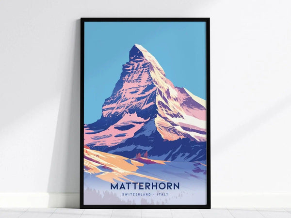 A framed poster of the Matterhorn showcases the iconic Alpine peak with vibrant colors and a modern design, set against a light blue background. Text reads Matterhorn, Switzerland - Italy.