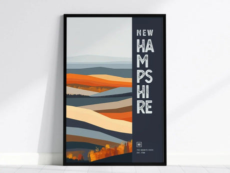 Framed poster featuring abstract, colorful ridgelines with bold New Hampshire text on the side. The design includes warm tones and a modern aesthetic.