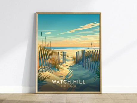 A framed poster of Watch Hill, Rhode Island, depicts a sandy beach path with wooden fencing, leading to the ocean under a colorful sky at sunset.