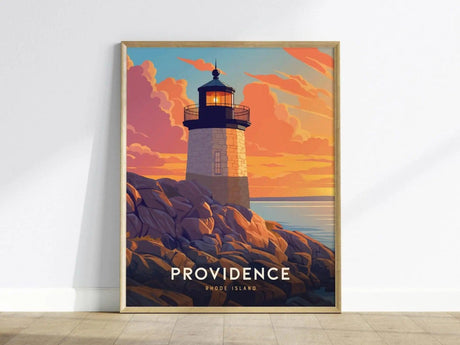 Framed poster of a lighthouse at sunset, with vibrant orange clouds and rocky coastline. The word PROVIDENCE is prominently displayed at the bottom.