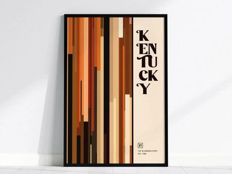 Abstract poster featuring vertical stripes in warm hues with the word Kentucky in bold letters. The design is minimalist, with The Bluegrass State noted at the bottom.