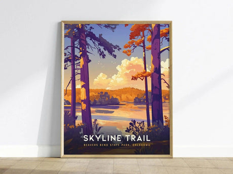 A framed poster of the Skyline Trail at Beavers Bend State Park, Oklahoma, featuring vivid orange and purple trees overlooking a serene lake and distant forested hills.
