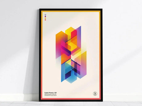 Framed modern abstract poster featuring colorful intersecting prisms with layered transparency on a light background. The design includes vibrant hues of yellow, pink, and blue.