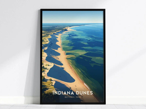 A framed poster of Indiana Dunes National Park features a stylized aerial view of sandy beaches and blue waters. The artwork highlights the natural beauty of Lake Michigans shoreline.
