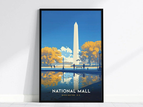 Framed poster of the Washington Monument with vibrant autumn trees and a reflective pool, set against a clear blue sky. Text reads National Mall, Washington, D.C. at the bottom.