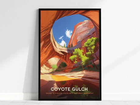 Framed poster of Coyote Gulch featuring vibrant red canyon walls, a bright blue sky, and green trees. The text reads Coyote Gulch, Grand Staircase–Escalante National Monument.