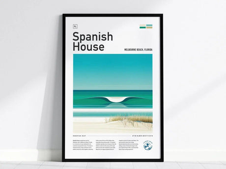 Framed poster depicting a stylized wave and beach scene titled Spanish House, with text Melbourne Beach, Florida and Sebastian Inlet below. The background is a plain white wall.