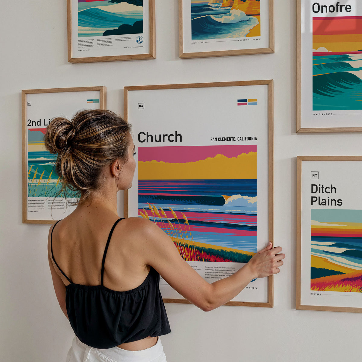 Surf Spots Gallery Wall | 8 Symmetrical Posters Framed Grid Surfer Gift — styled in a modern interior
