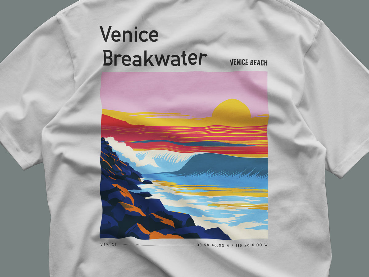 Venice Breakwater Surf T-Shirt | Laid-Back LA Wave Art — close-up of the left-chest pocket print