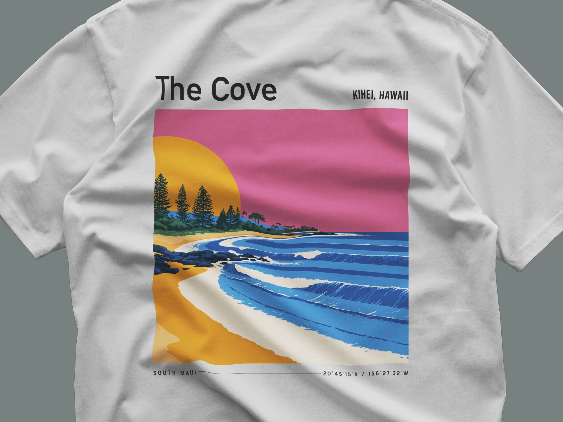 The Cove, Hawaii Surf T-Shirt | Hidden Wave Aloha Art Tee — close-up of the left-chest pocket print