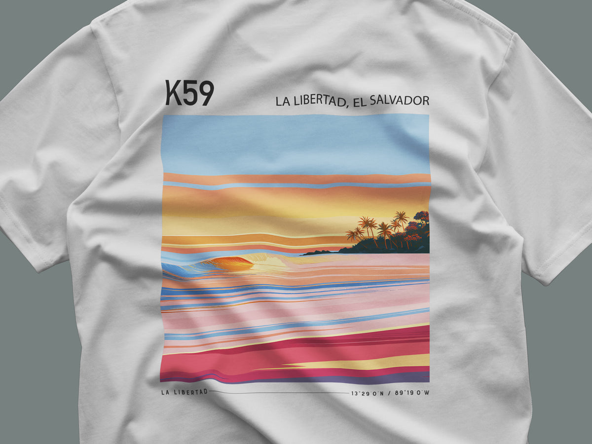 K59, El Salvador Surf T-Shirt | Central American Wave Art Tee — close-up of the left-chest pocket print