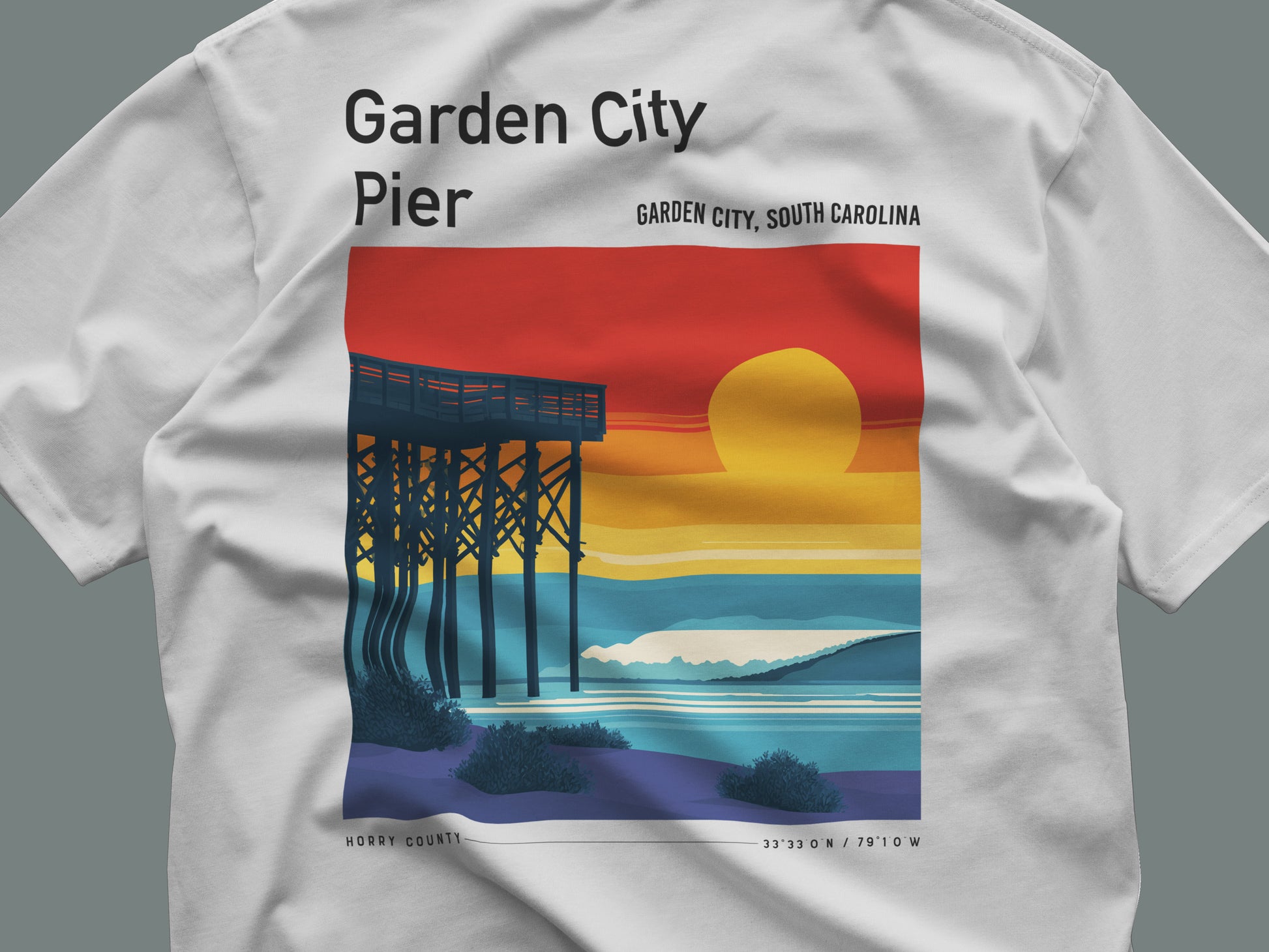 Garden City Pier Surf T-Shirt | Low Country Wave Art Tee — close-up of the left-chest pocket print