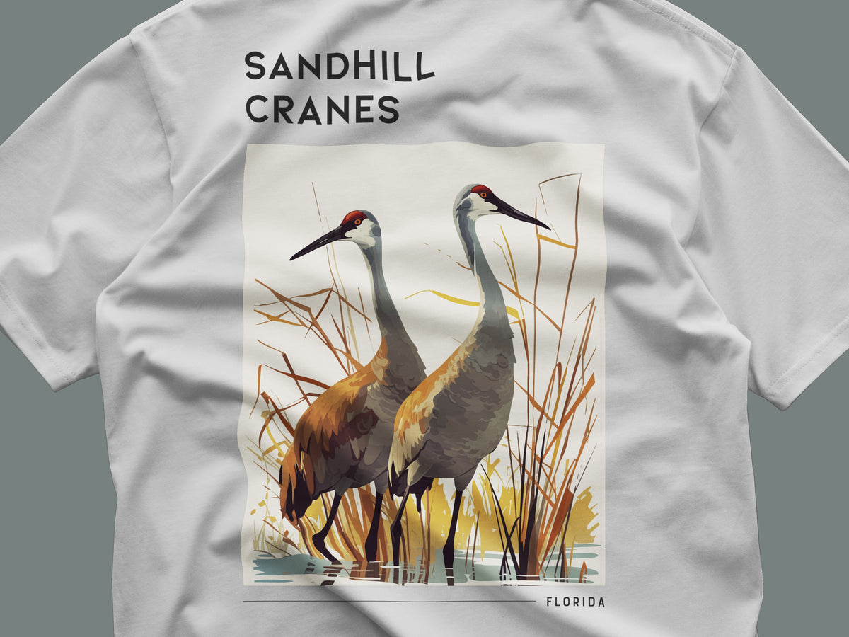 Sandhill Cranes Florida Travel T-Shirt | Wild Birds of the Sunshine State — close-up of the left-chest pocket print