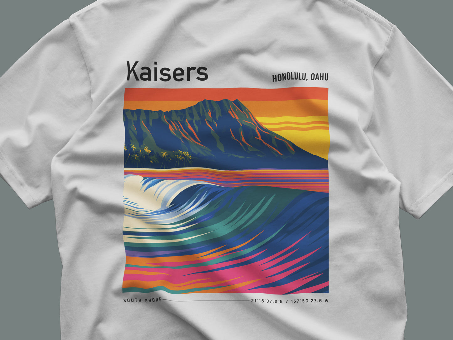 Kaisers Surf T-Shirt | Hawaiian Reef Break Wave Art — close-up of the left-chest pocket print