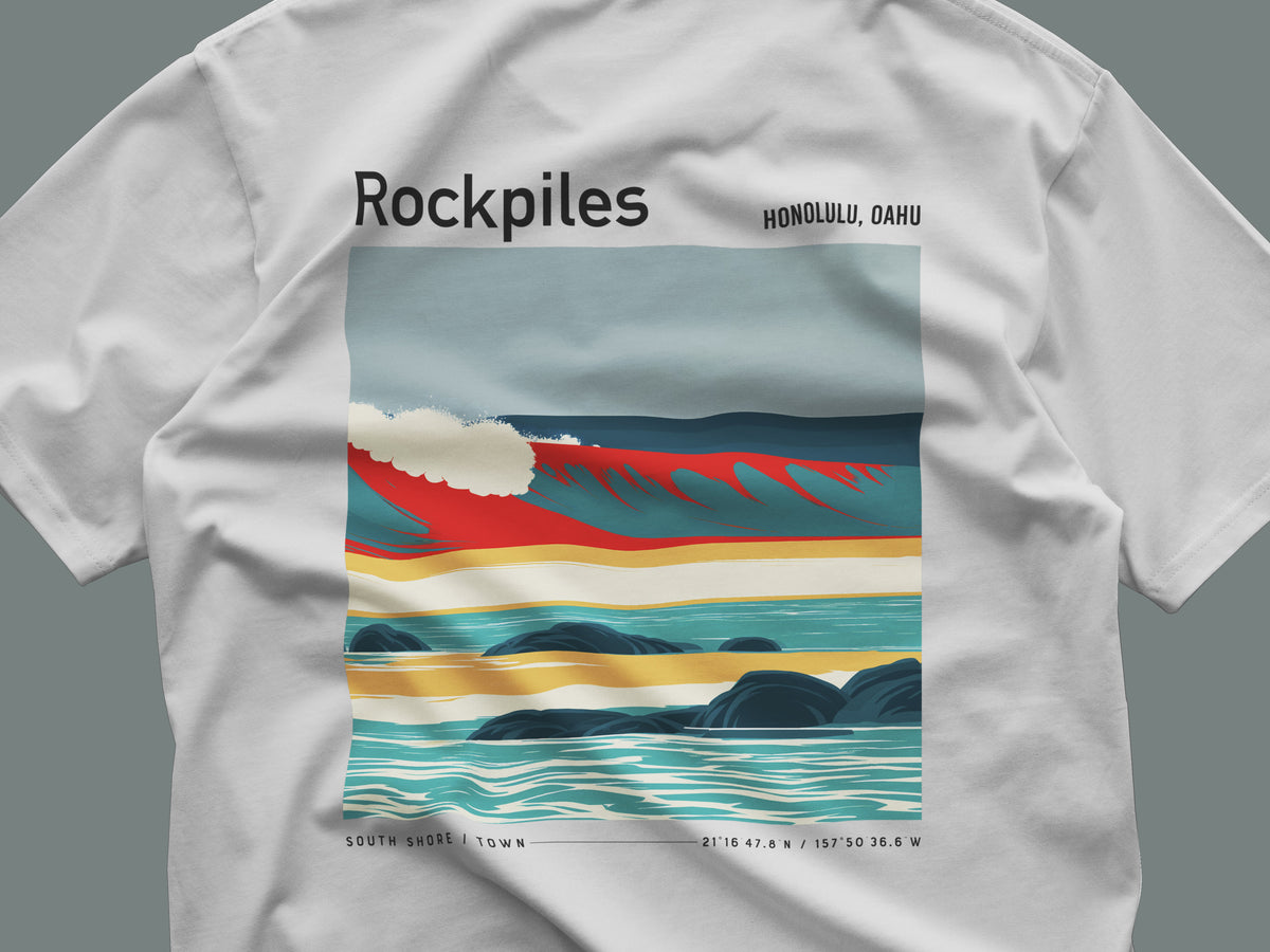 Rockpiles Surf T-Shirt | Raw Hawaiian Reef Wave Tee — close-up of the left-chest pocket print