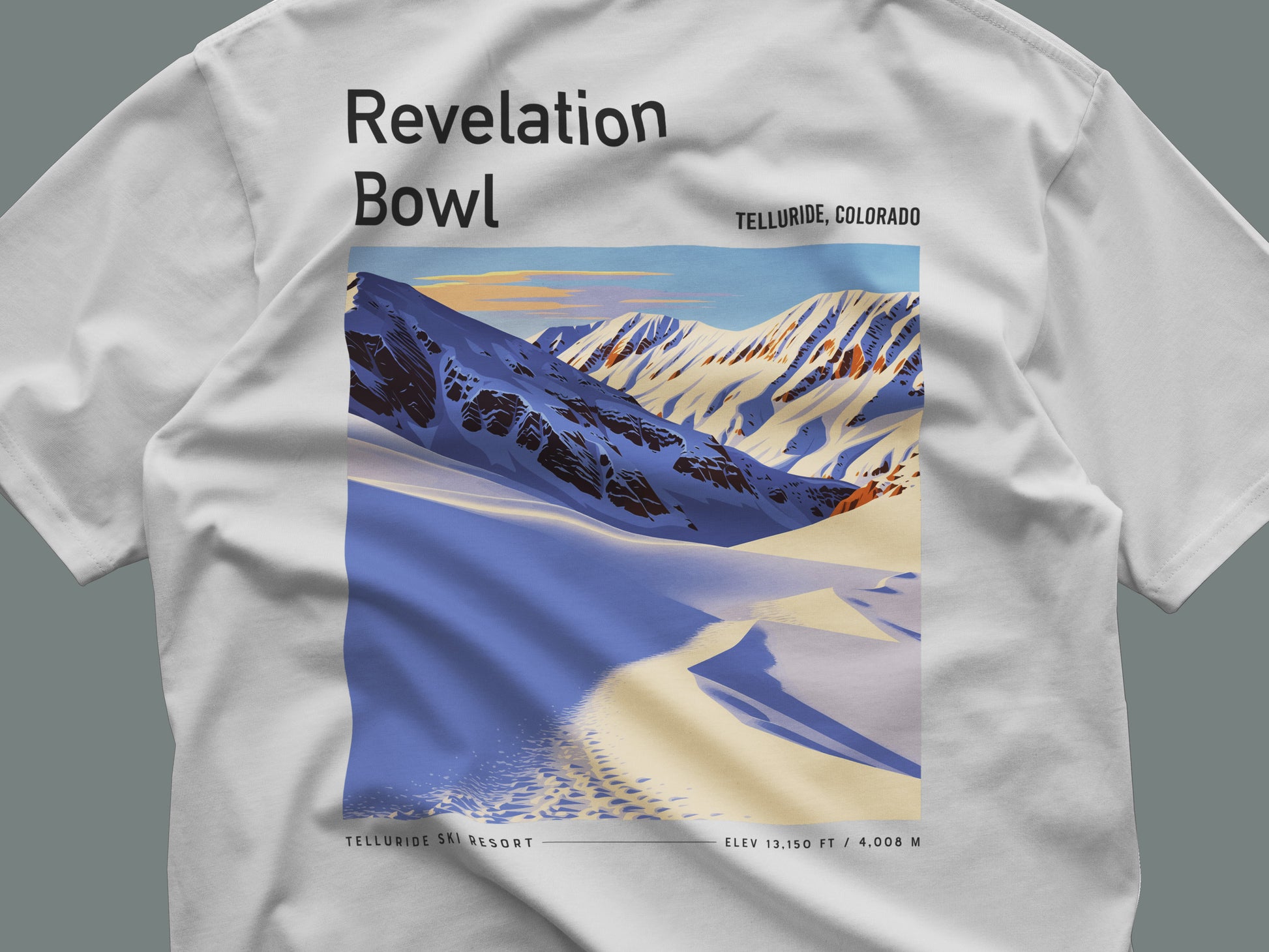 Revelation Bowl Ski T-Shirt | Telluride Mountain Art Tee — close-up of the left-chest pocket print