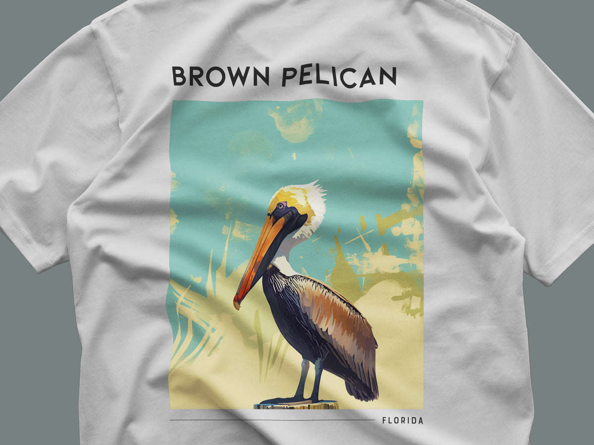 Florida Travel T-Shirt | Brown Pelican Coastal Art Tee — close-up of the left-chest pocket print