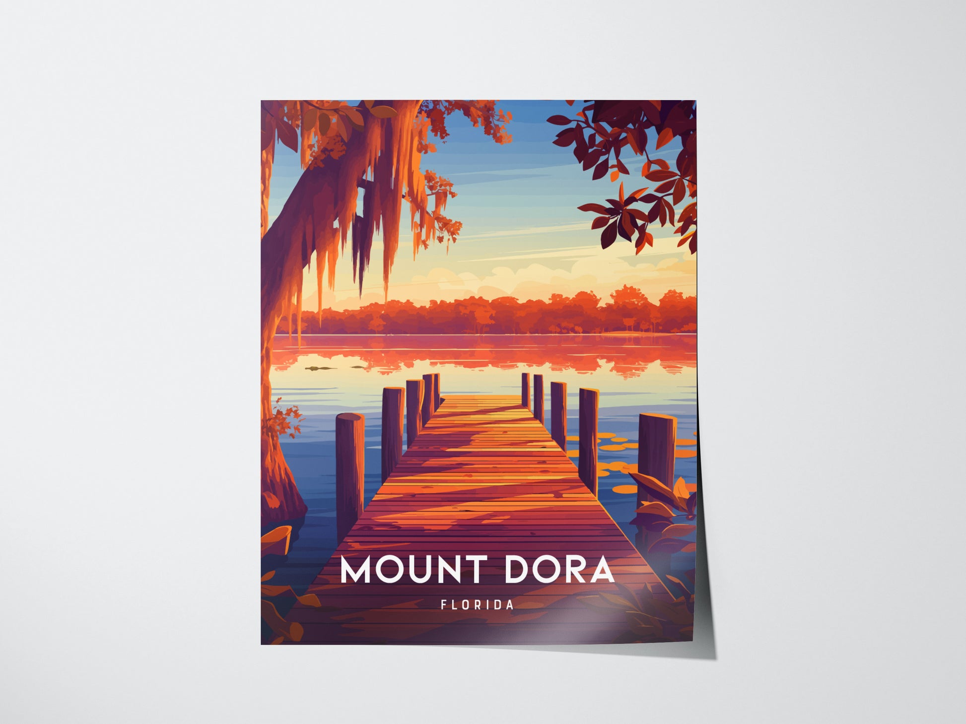 A vibrant poster of Mount Dora, Florida, depicting a wooden dock extending into a serene lake at sunset, surrounded by lush foliage and reflected orange and pink skies.