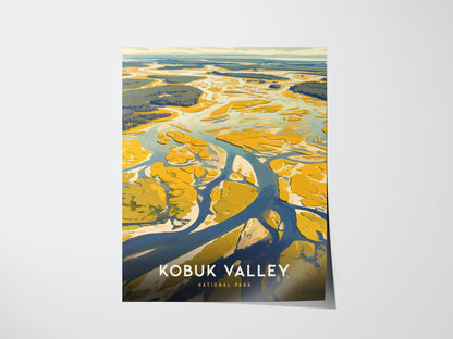 A vibrant poster of Kobuk Valley National Park featuring abstracted sand dunes and winding rivers in yellow and blue hues, with text at the bottom.