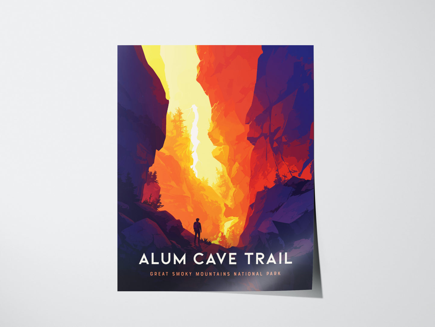 A vibrant poster depicts a hiker on a trail surrounded by towering cliffs in fiery red and orange hues, with the text Alum Cave Trail, Great Smoky Mountains National Park.