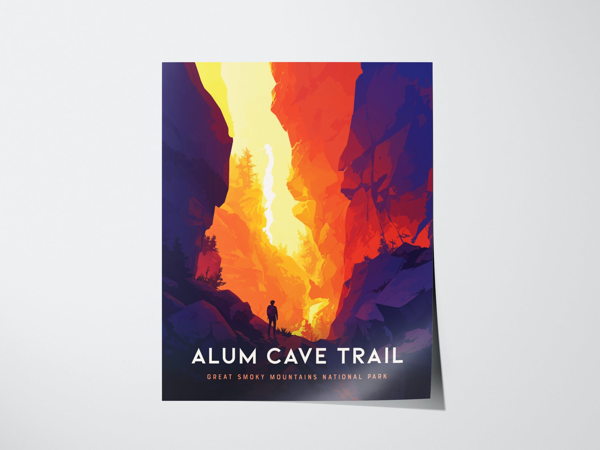 A vibrant poster depicts a hiker on a trail surrounded by towering cliffs in fiery red and orange hues, with the text Alum Cave Trail, Great Smoky Mountains National Park.