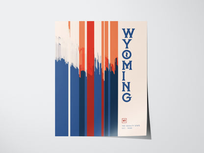 Minimalist poster featuring vertical red, white, and blue brush strokes with the word WYOMING in bold blue letters. Includes The Equality State Est. 1890 at the bottom.