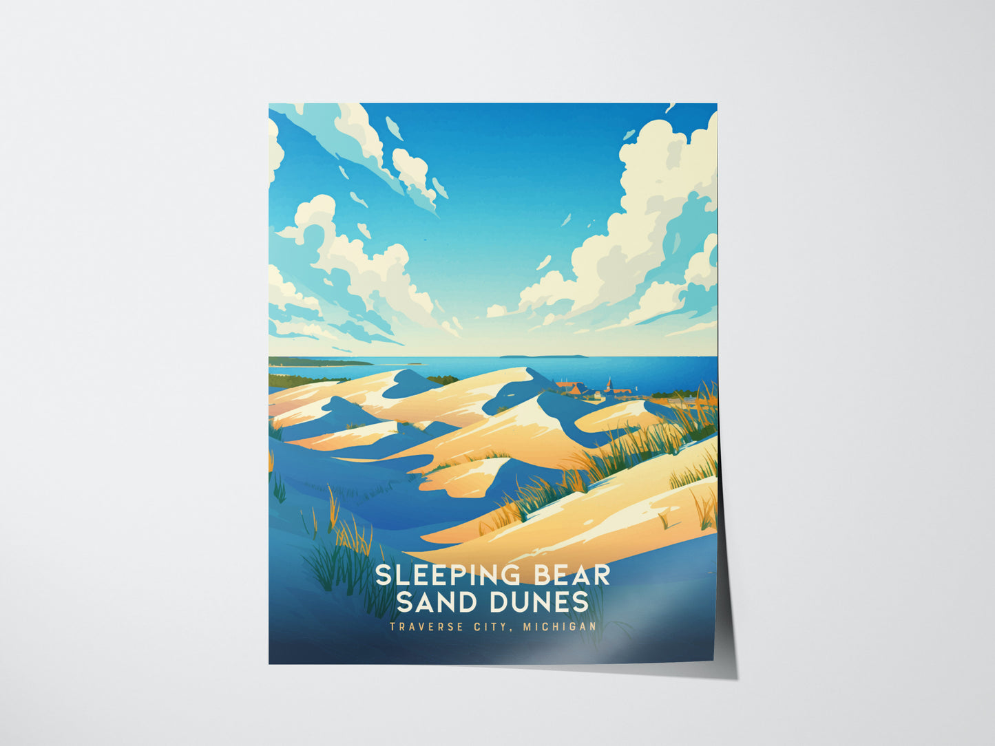A vibrant poster depicts the Sleeping Bear Sand Dunes under a bright blue sky with fluffy clouds, golden sand, and distant turquoise waters.