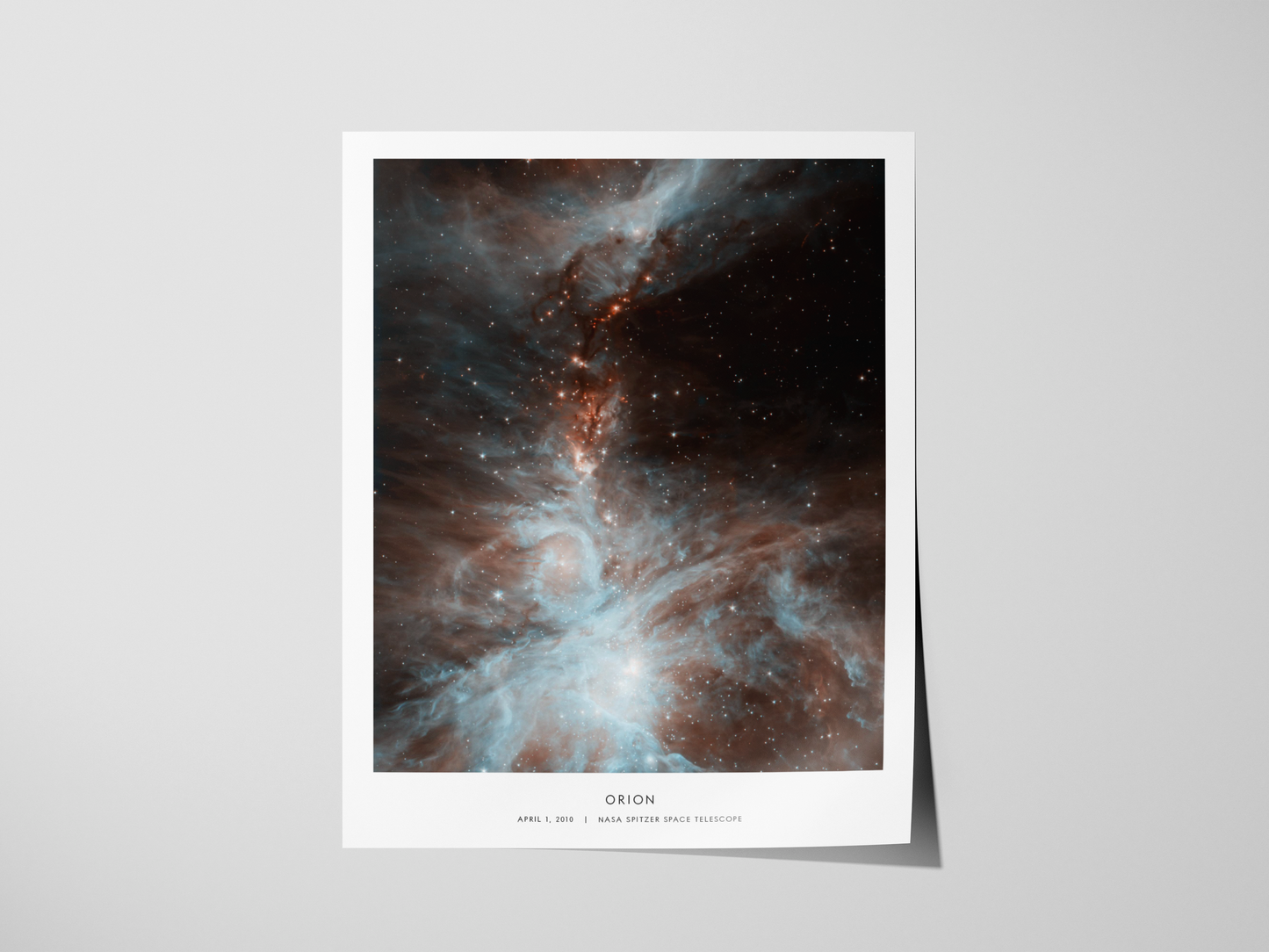 Framed space-themed artwork of Orion Nebula on a gray background