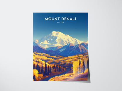A vibrant poster of Mount Denali showcasing the snowy peak against a clear blue sky, with colorful autumnal trees and rolling hills in the foreground.