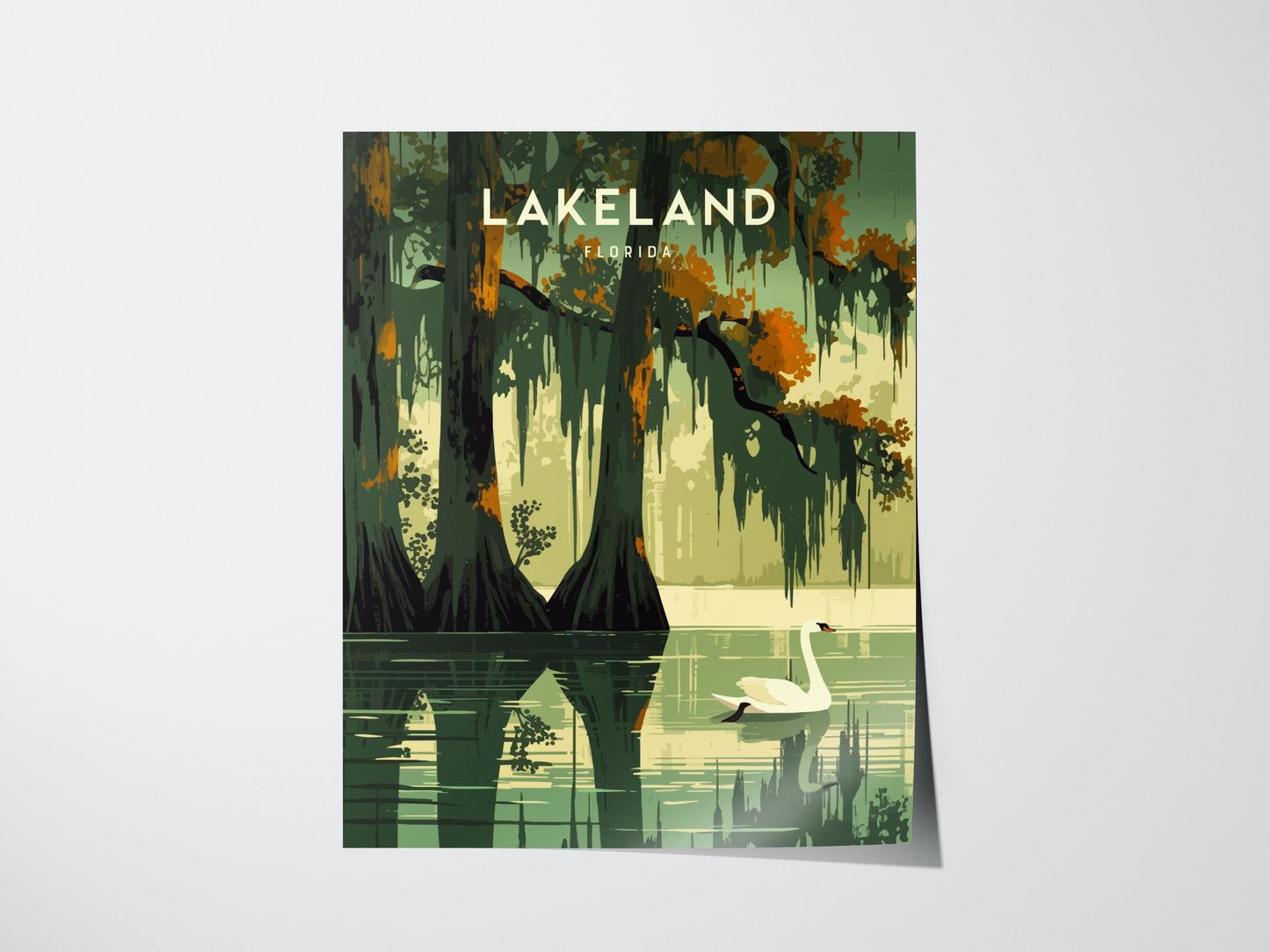 Illustrated poster featuring a serene lake scene with a swan gliding across water, surrounded by moss-covered trees and autumn foliage, titled Lakeland Florida. The reflection enhances the tranquil atmosphere.
