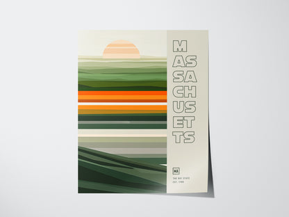 A minimalist poster features horizontal stripes in green, orange, and beige tones with a setting sun. The text Massachusetts is vertically aligned on the right side.