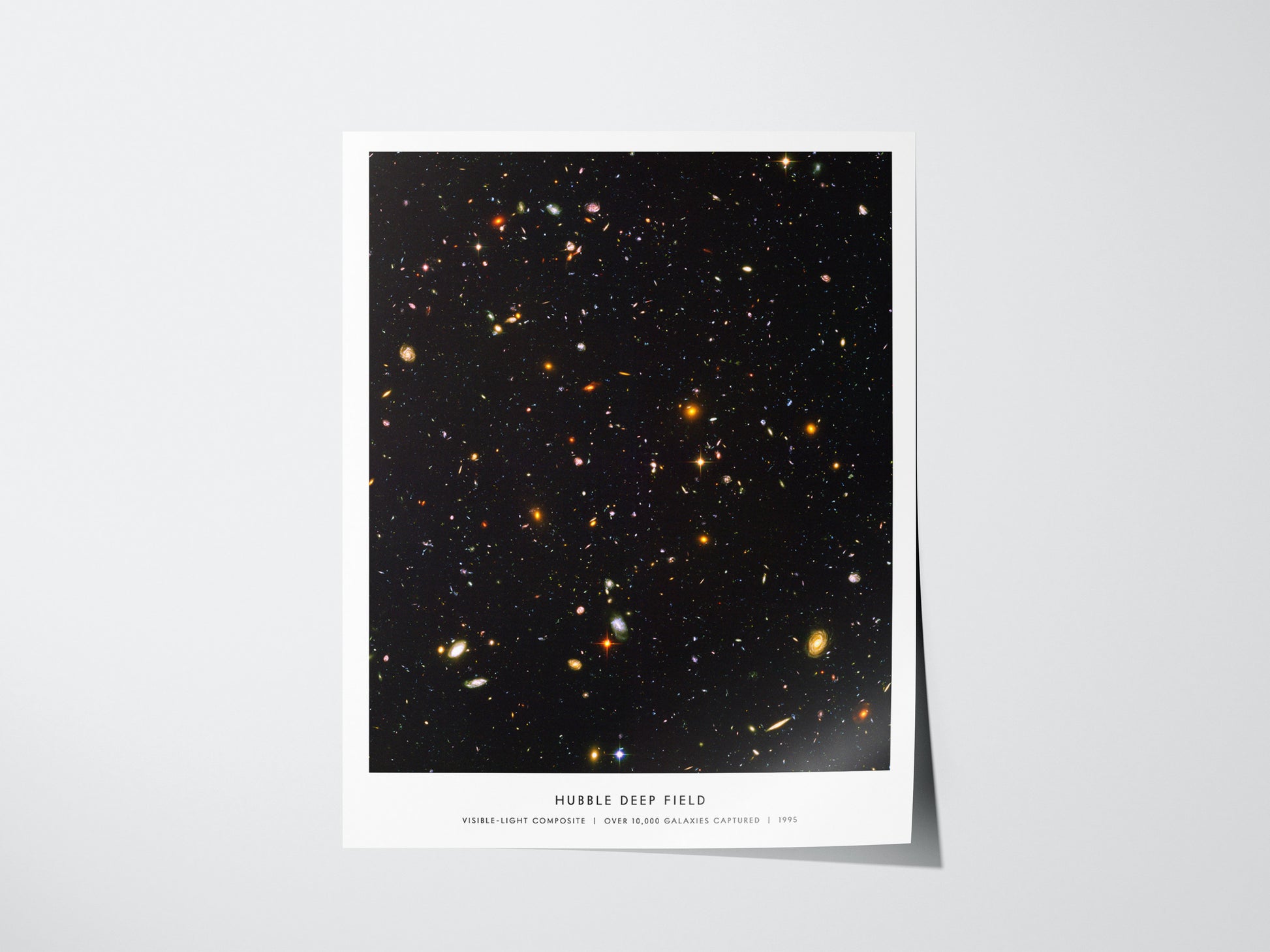 Poster of the Hubble Deep Field with a white border on a light gray background