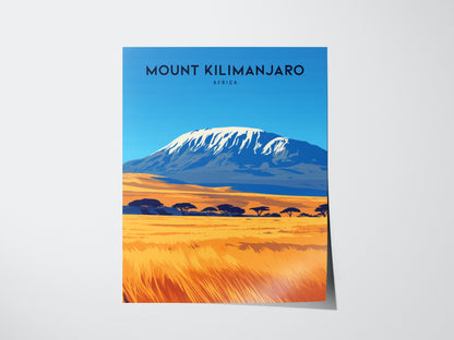 Illustrated poster of Mount Kilimanjaro with a snow-capped peak, vibrant blue sky, and golden savanna foreground. The words Mount Kilimanjaro Africa appear at the top.