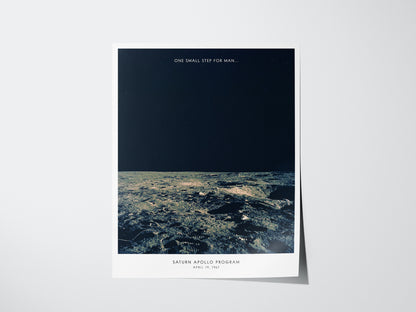 Poster of the lunar surface with text 'One Small Step for Man' from the Apollo Program on a white background.