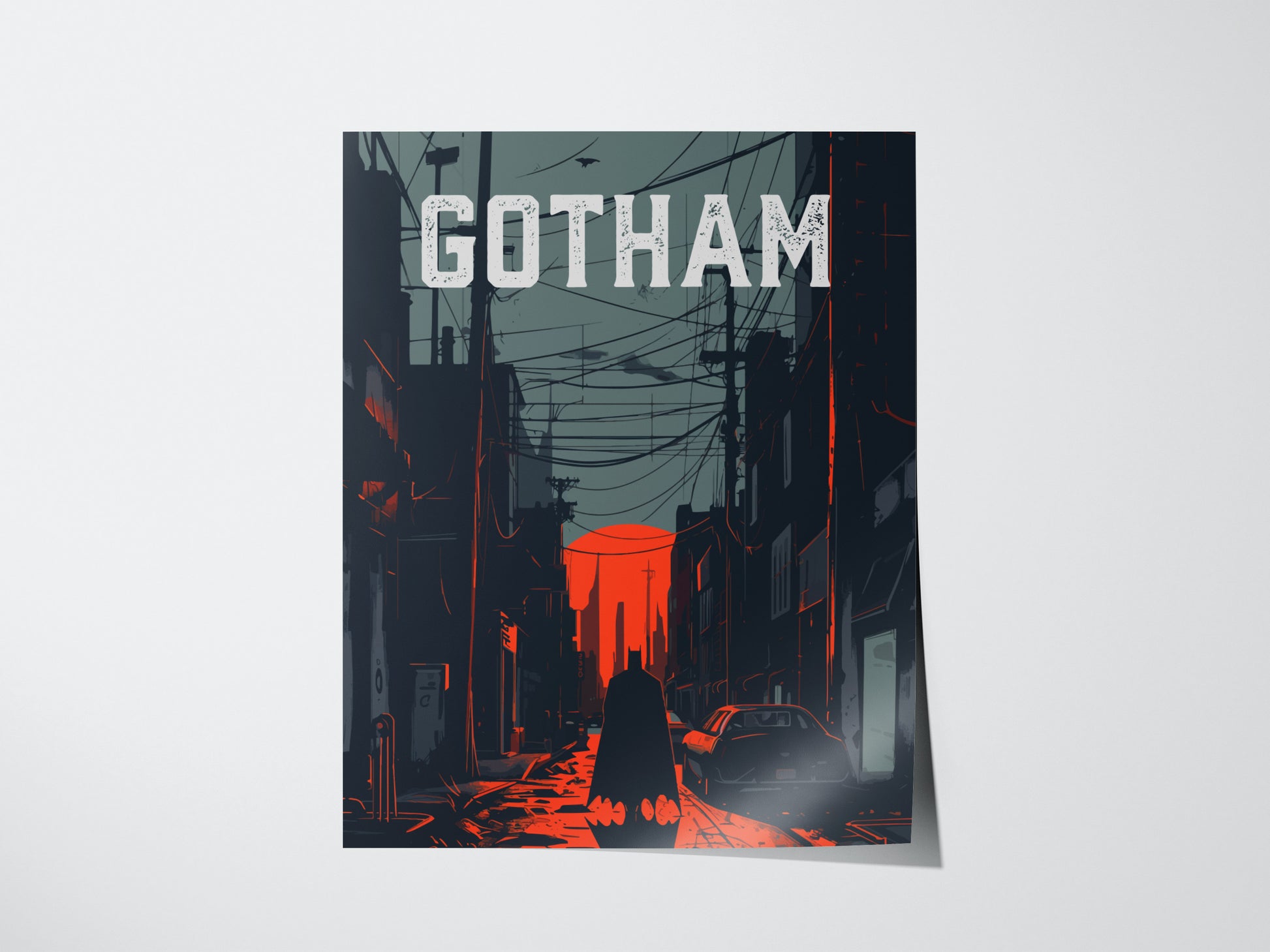 A poster titled GOTHAM depicts a dark, shadowy city street with a figure standing in the foreground. The scene features deep grays and bold red highlights, creating a noir atmosphere. Power lines and buildings frame the moody setting.
